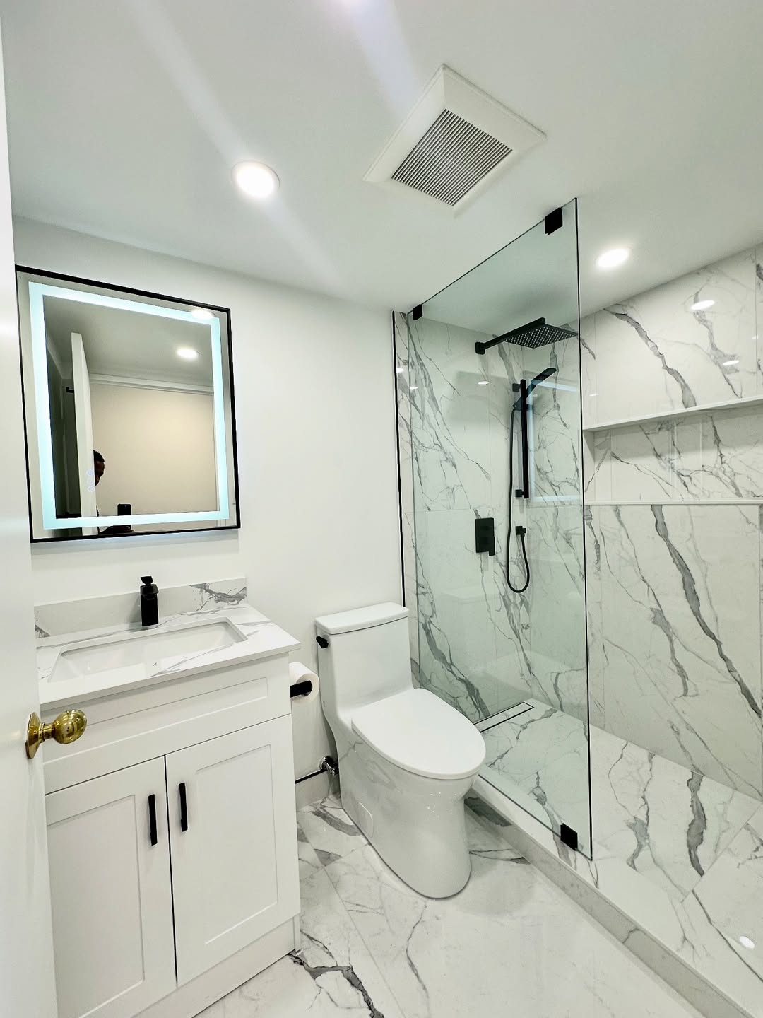 Marble bathroom with glass shower